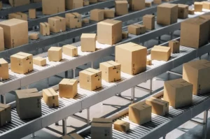 boxes on roller conveyors showing how e-commerce has impacted material handling