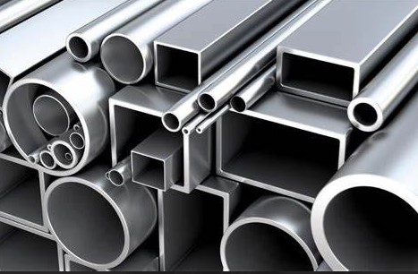 various square and circular tubes made of stainless steel, stacked up