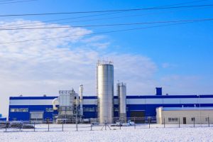 factory in the snow, displaying winter material handling challenges